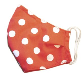 White polka dot face-mask on red fabric